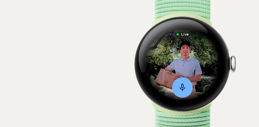 The screen of the Google Pixel Watch 3 displaying a Nest Camera feed of a person outside of a front door.